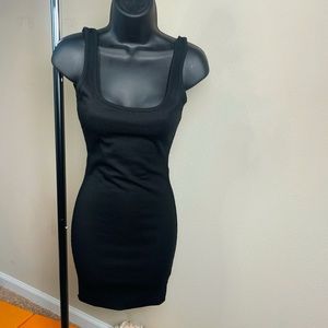 Fashion Nova black mini dress.